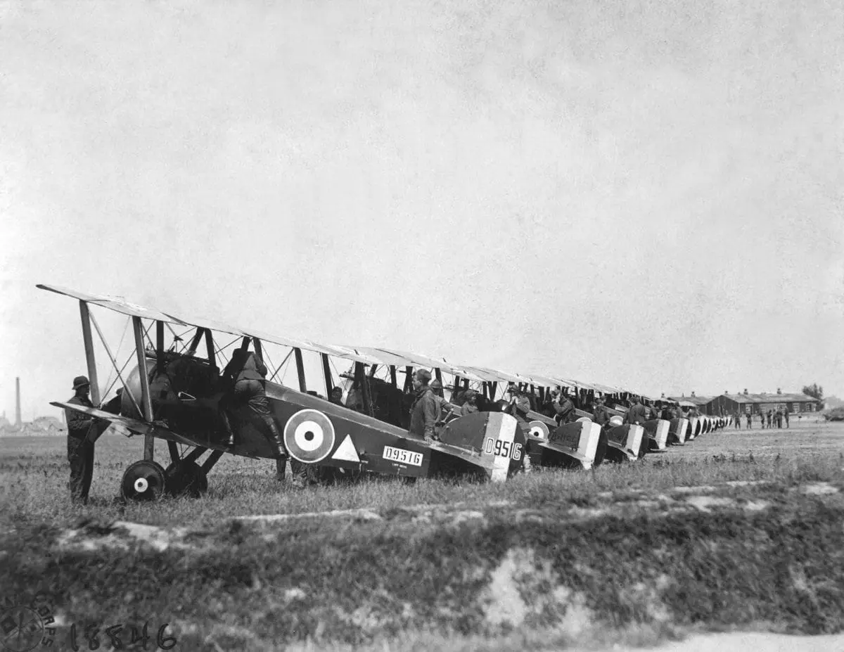 American pilots and mechanics prepare for daylight raids on German trenches and cities. Petite Sythe, France. WWI. Aug. 16, 1918