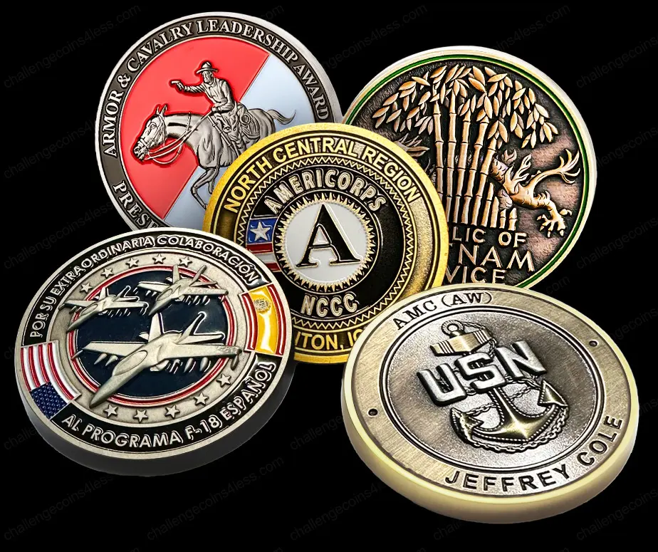 A collection of four diverse military challenge coins. Clockwise from top left: a red coin with a horseman for the 'ARMOR & CAVALRY LEADERSHIP AWARD,' a green and gold coin with a wheat sheaf for 'NORTH CENTRAL REGION AMERICORPS,' a gold and silver 'USN' coin with an anchor for Jeffrey Cole, and a multicolored coin celebrating the 'F-18 ESPAÑOL' program with aircraft and flags.