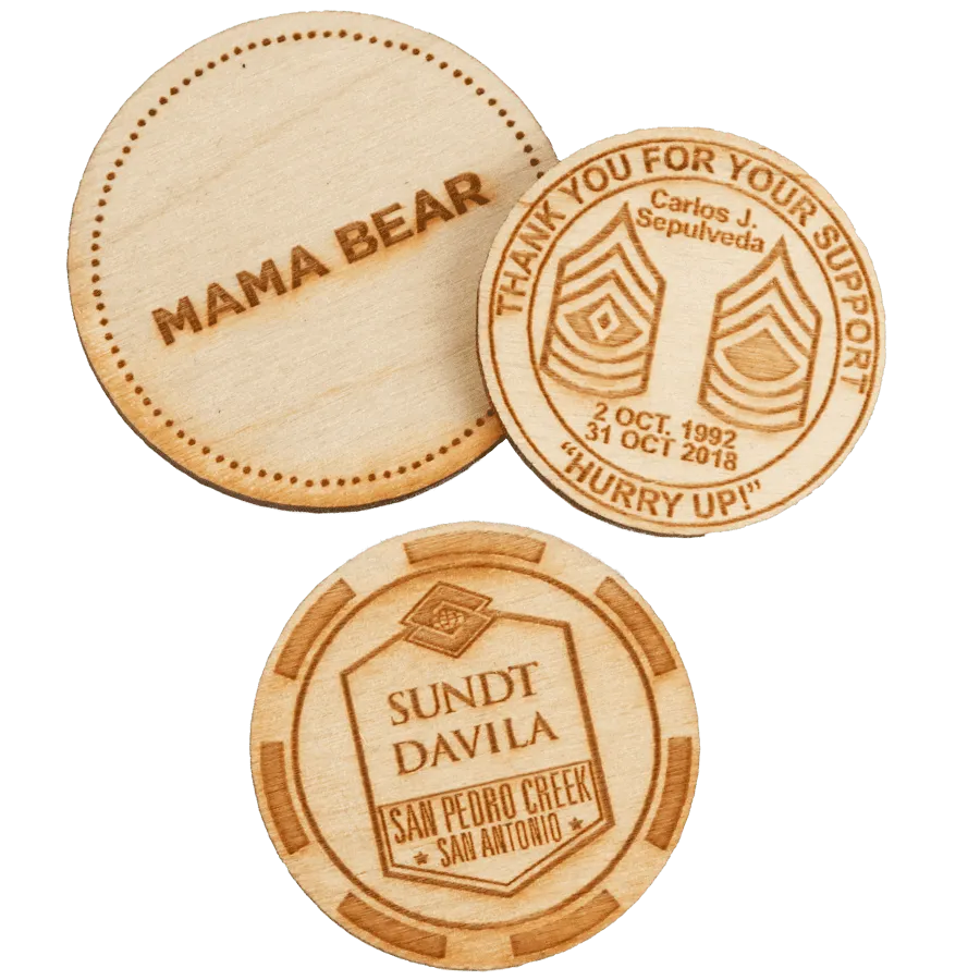 a few examples of wooden poker chips with custom designs