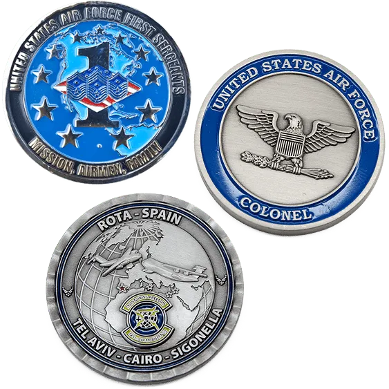 three examples of air force challenge coins with custom designs