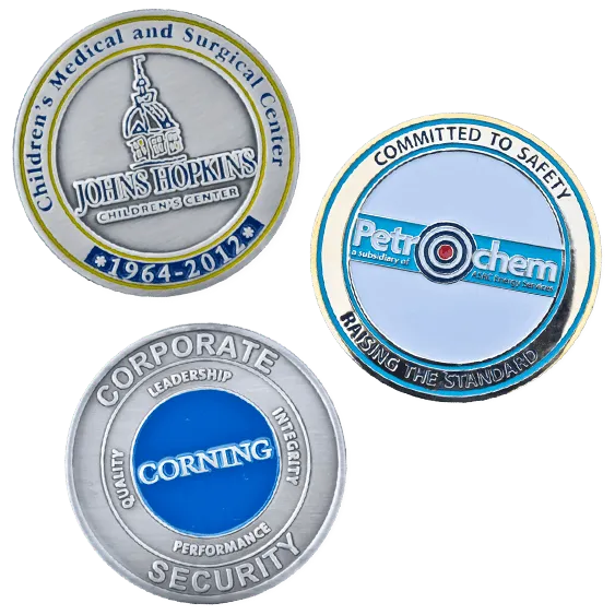 three examples of corporate challenge coins with custom designs